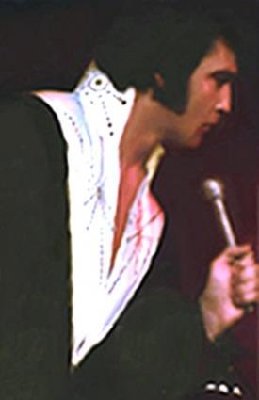 Misses Kim Polston at B&K Enterprises who confirmed that Elvis actually wore a Black Cisco Kid Suit with white yokes..jpg
